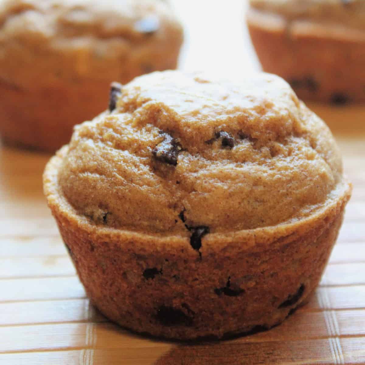 Pumpkin Chocolate Chip Muffins on a place mat