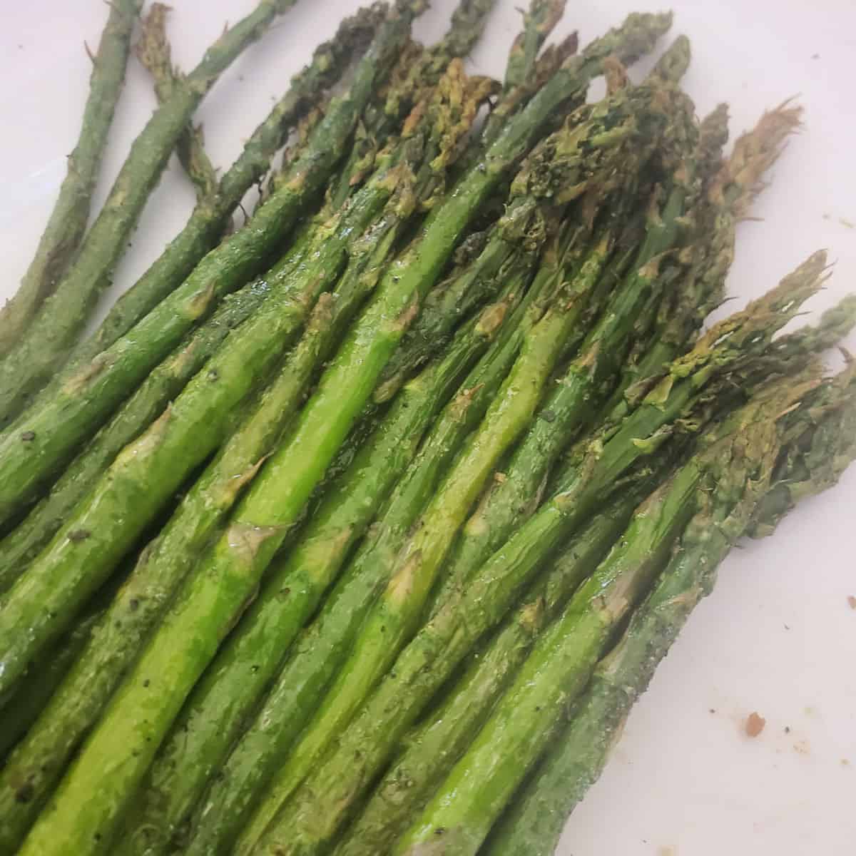 Asparagus on a white plate