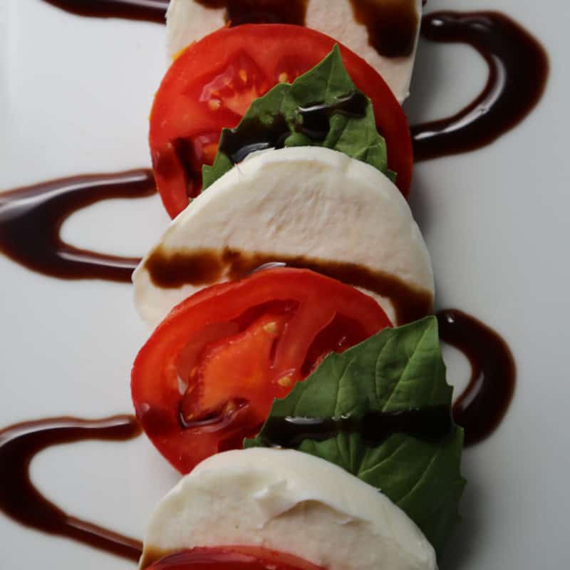 tomatoes, mozzarella, basil and balsamic glaze for caprese salad