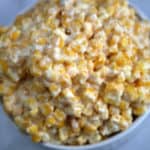 creamed corn in a white bowl