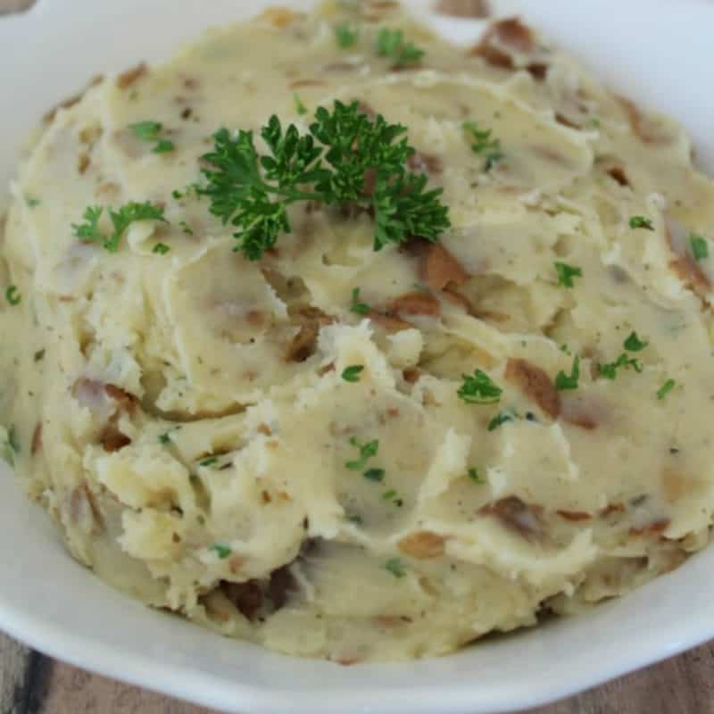 garlic herb mashed potatoes in a white bowl
