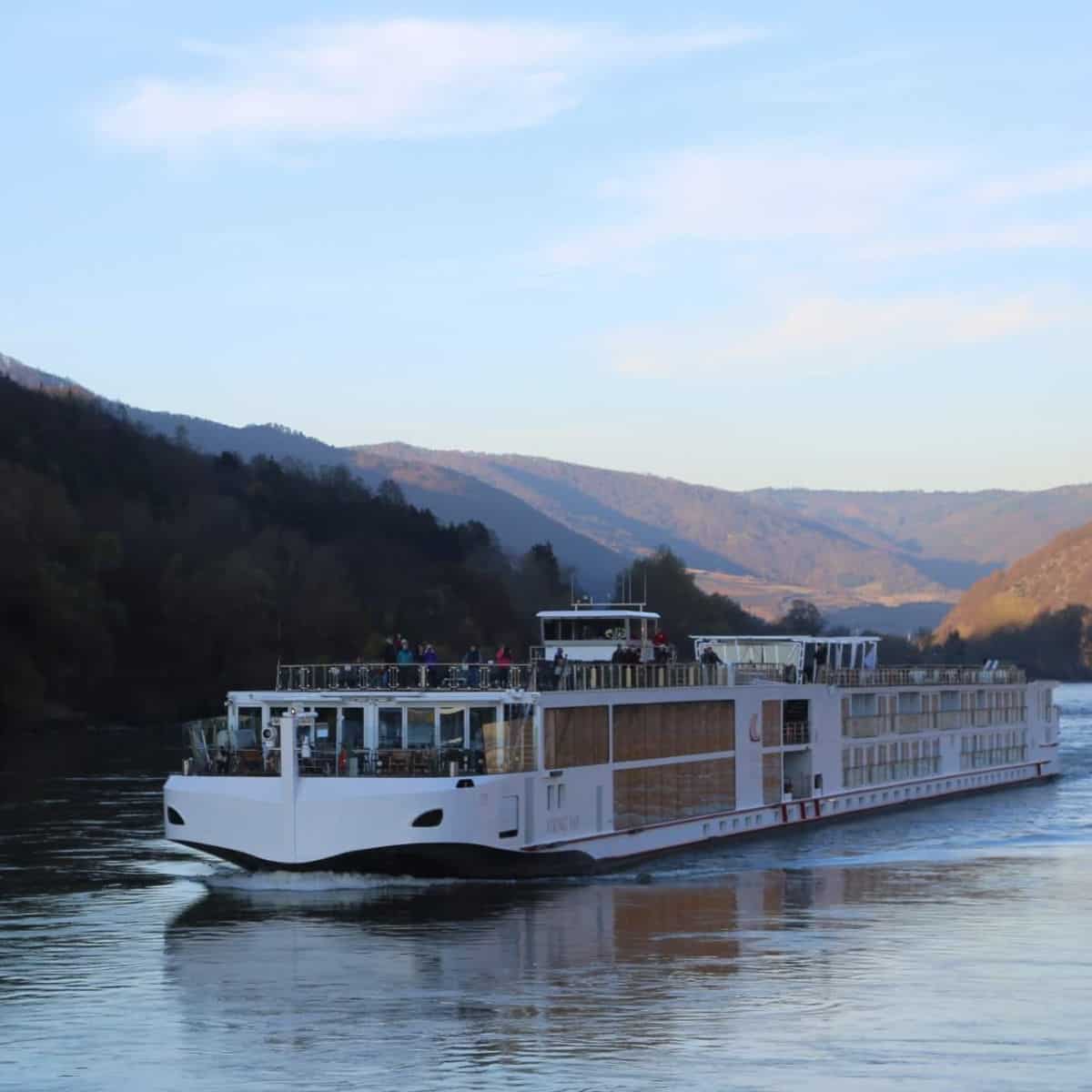 Viking River Cruise sailing through a river valley