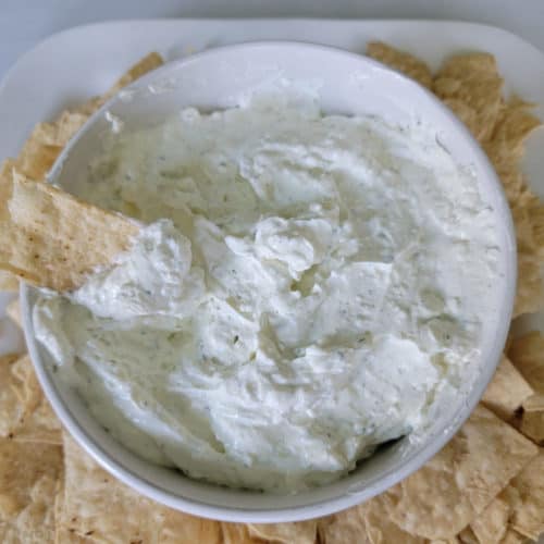 Hidden Valley Ranch Dip in a white bowl with tortilla chips
