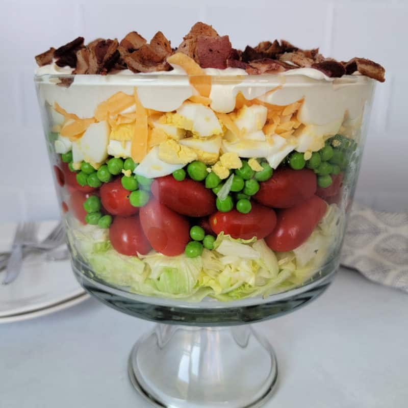 7 layer salad in a serving dish 