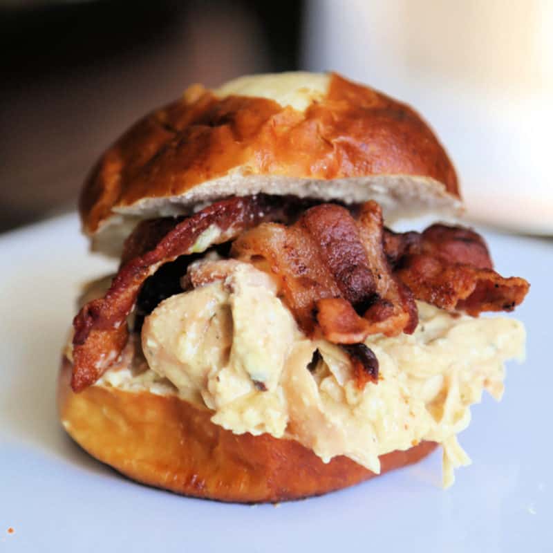 Bacon ranch chicken on a pretzel bun