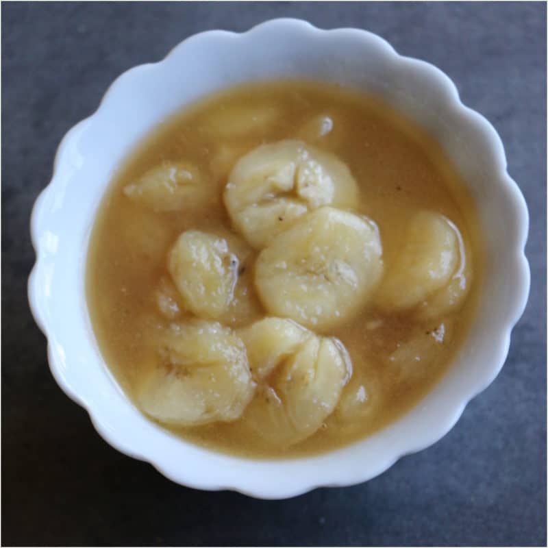 individual banana foster in a white bowl