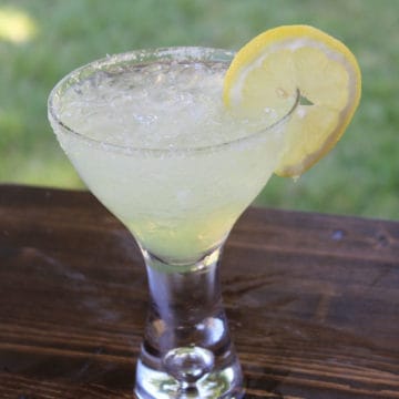 Lemon Sorbet Martini with lemon wheel garnish in a martini glass