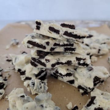 2-Ingredient Oreo Bark stacked on parchment paper