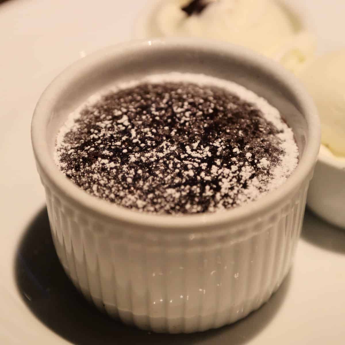 Carnival Chocolate Melting Cake in a white ramekin