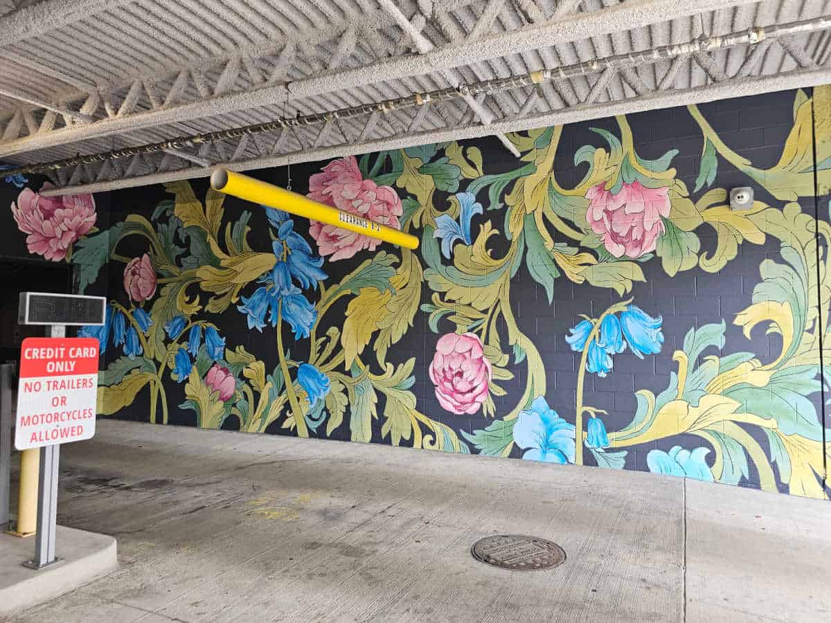 floral mural in a parking garage