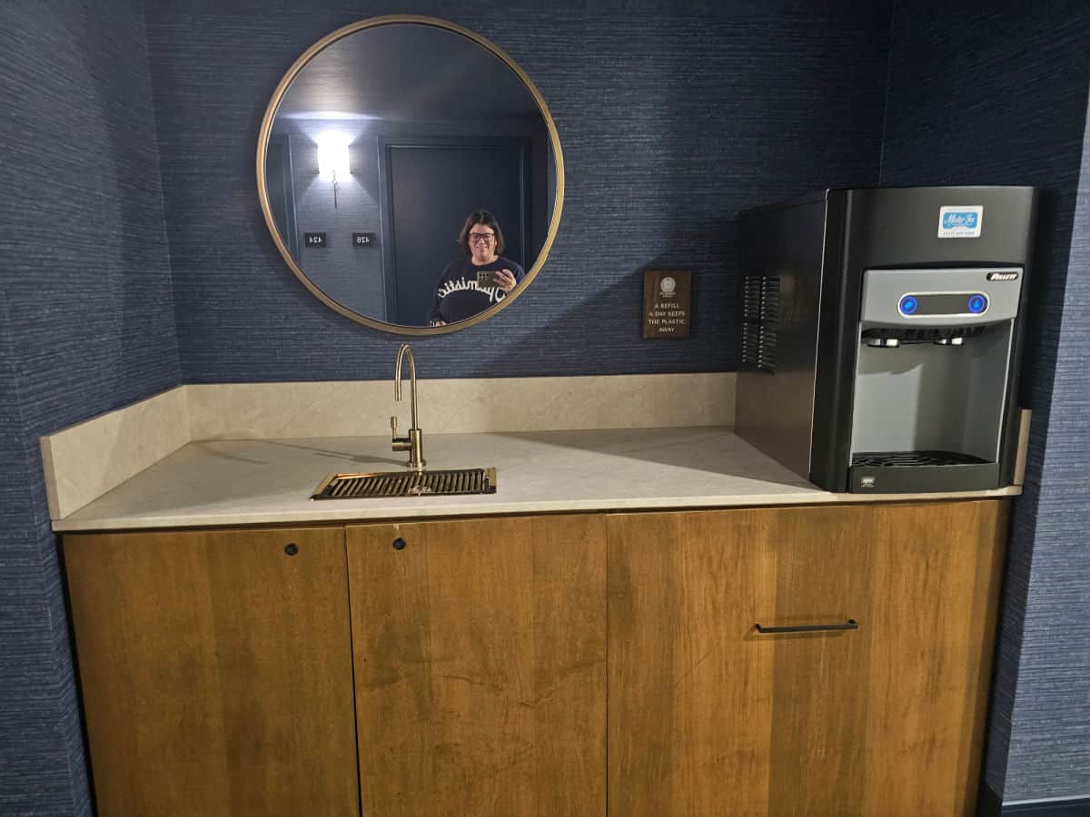 water bottle refill counter with sink and ice machine