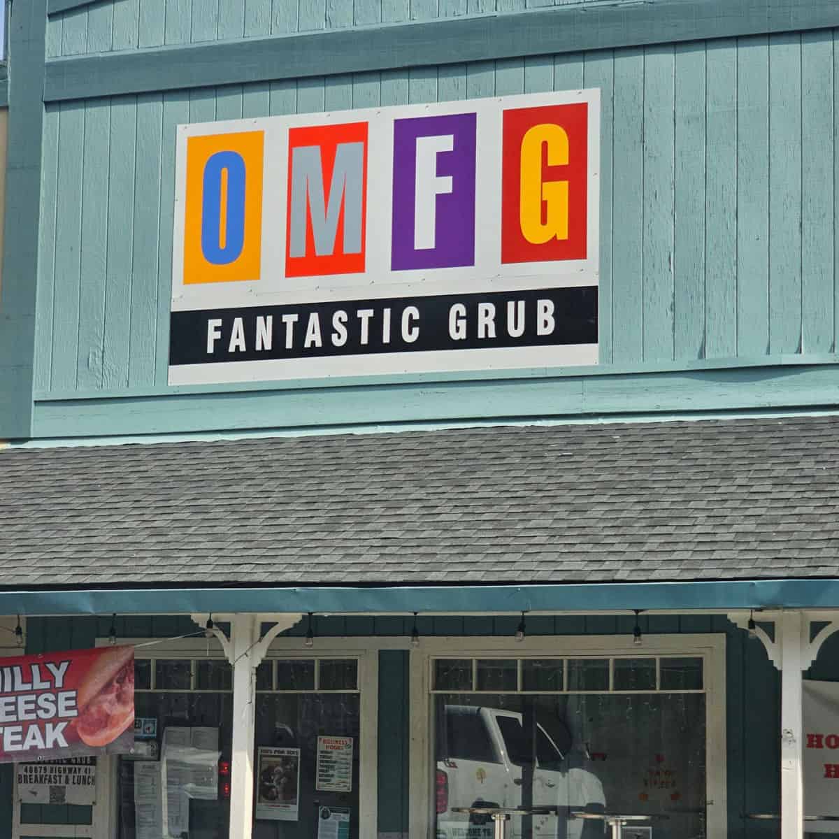 OMFG Fantastic Grub sign over the entrance to a restaurant in Oakhurst