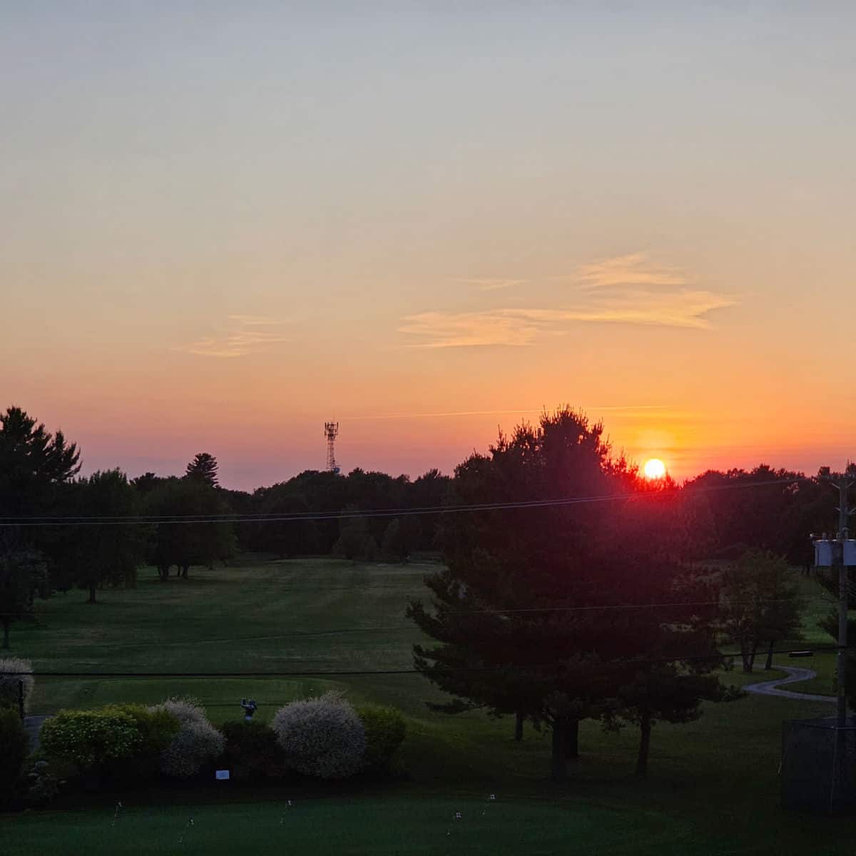 Sunset over the golf course at upscale La Cache du Lac Champlain in Venise-en-Québec