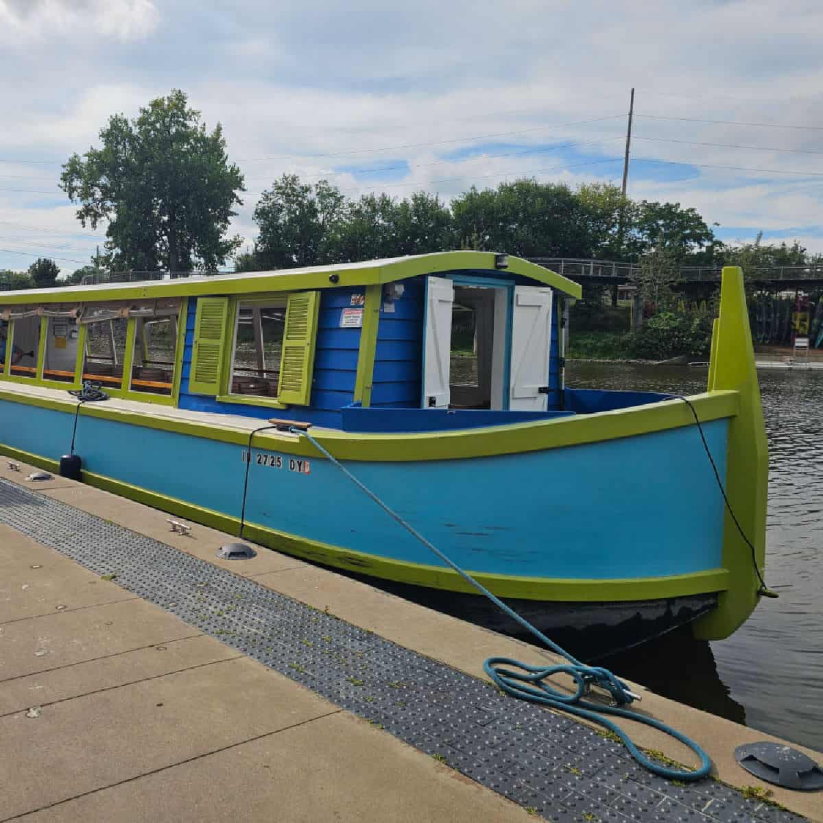 Blue and green sweet breeze canal boat docks